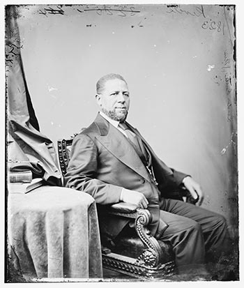 A black and white photograph of Hiram Revels. 