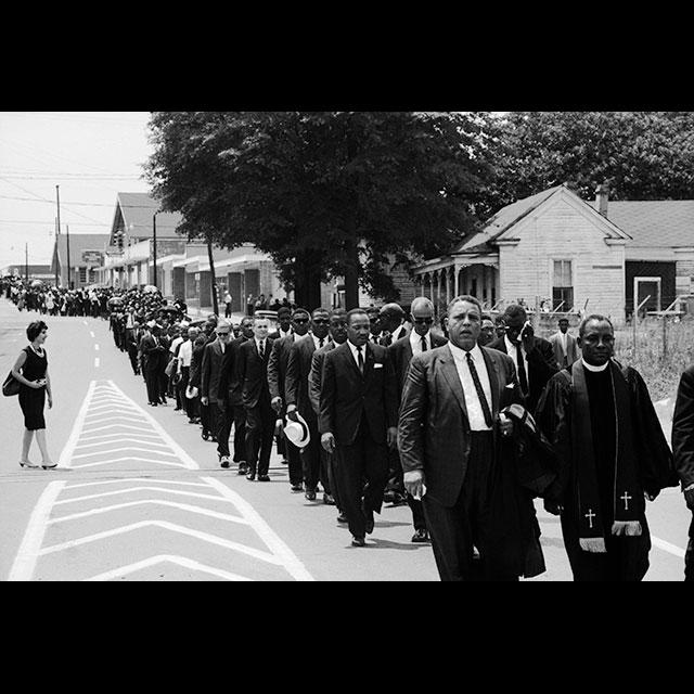 The funeral procession following the service for Medgar Evers
